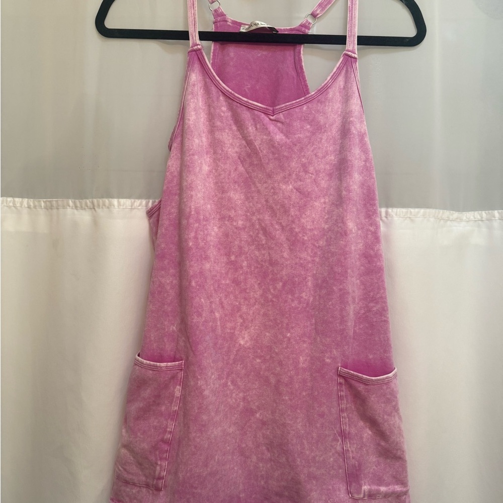 Pink distressed romper with Pockets